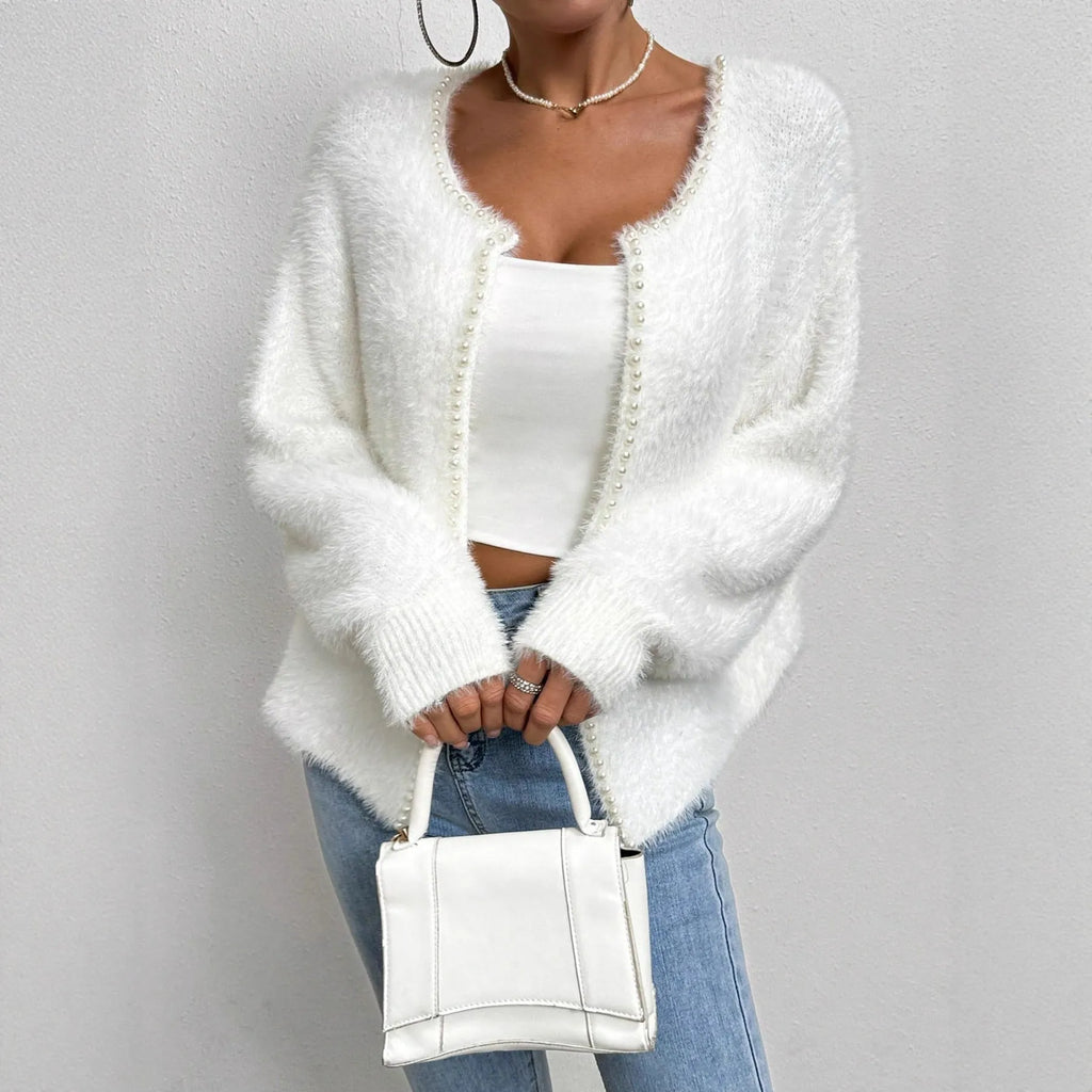 White women's V-neck cardigan with medium thickness polyester knit construction
