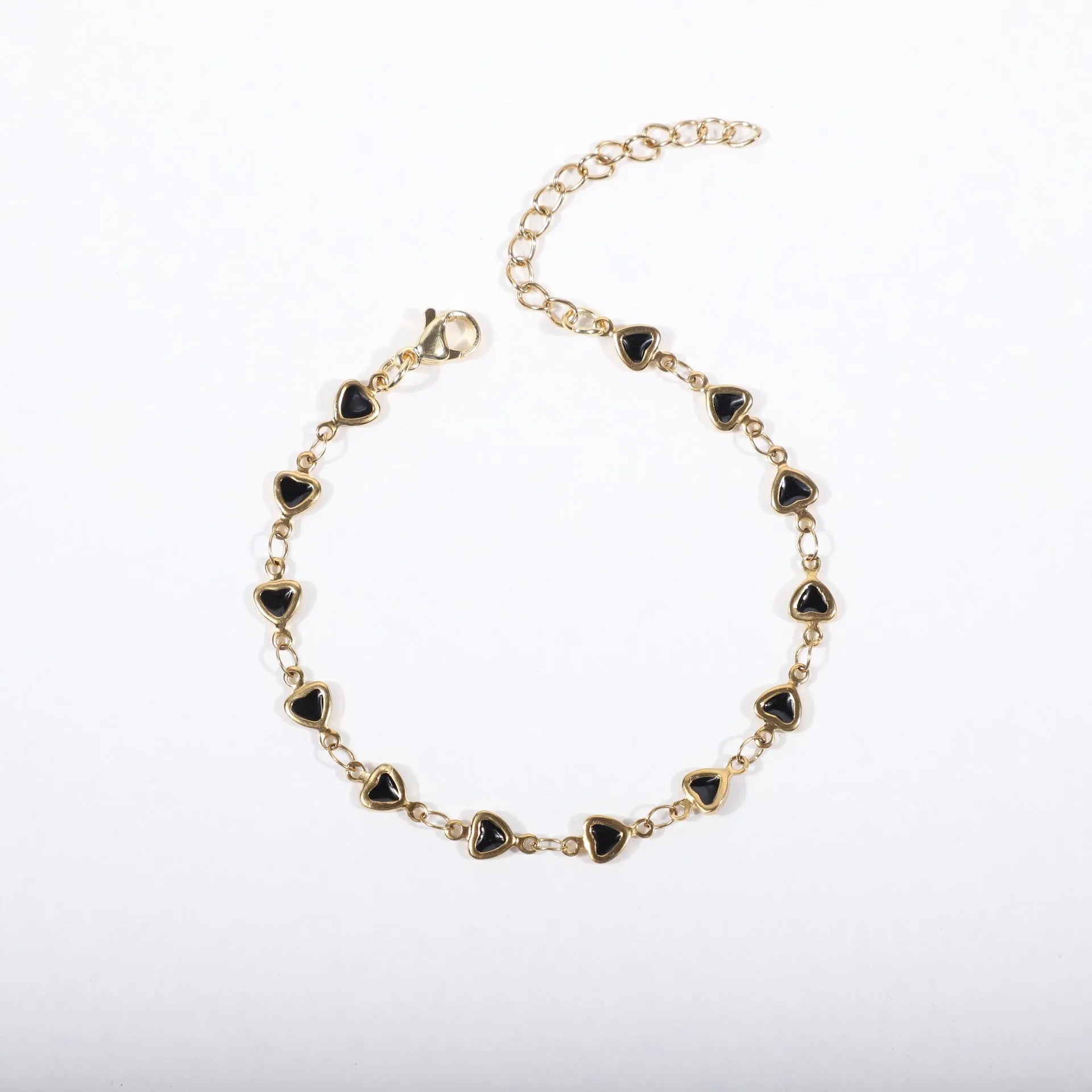 Stainless steel bracelet with heart design and gold plating in multiple colour options
