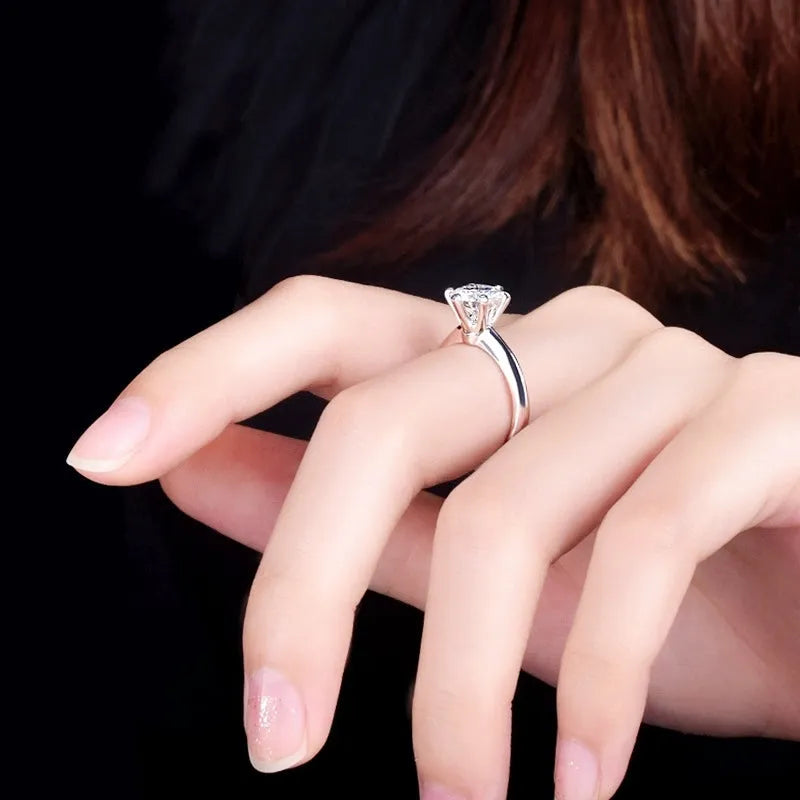 White gold plated zircon ring with six-claw geometric setting on white copper base