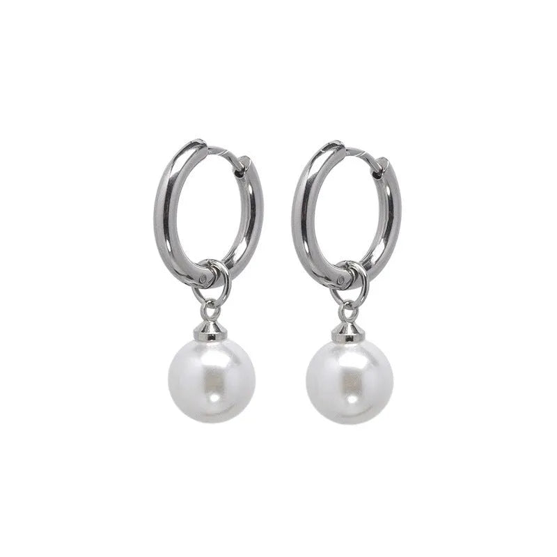 A pair of women's geometric alloy drop earrings with a round pearl centre and titanium steel post.