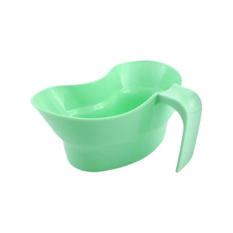 Green plastic nursing gargle cup with specialised spout for bedridden patient oral care