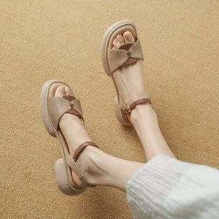 Women's beige platform sandals with chunky heel and open toe design on rubber sole