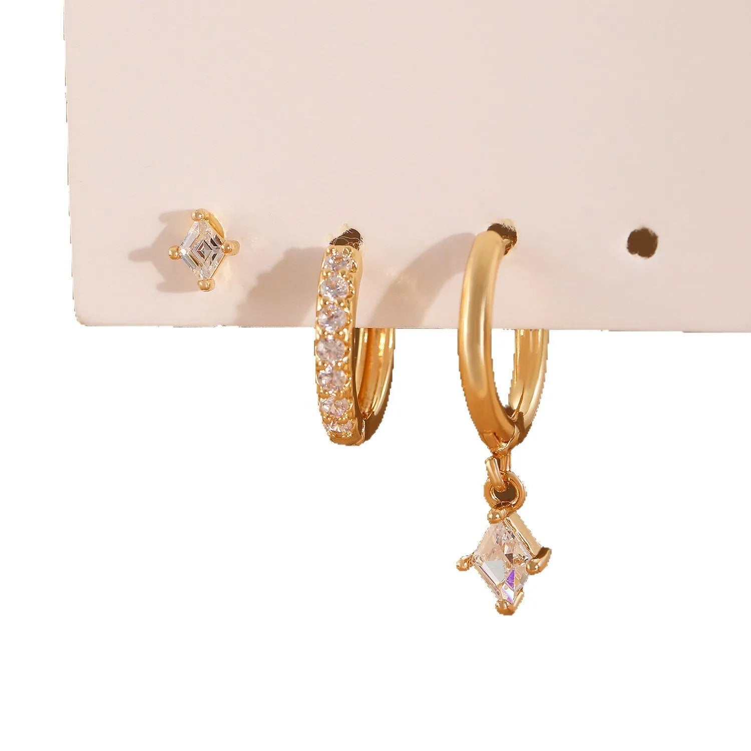 Three-piece ladies earring set with geometric zircon designs in gold and white copper jewellery