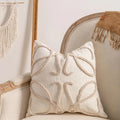 Decorative knitted sofa cushion cover with tassel trim in a choice of six patterns and two sizes.