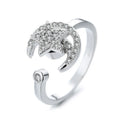 Gold copper micro-inlaid zircon star moon ring with adjustable opening on white background
