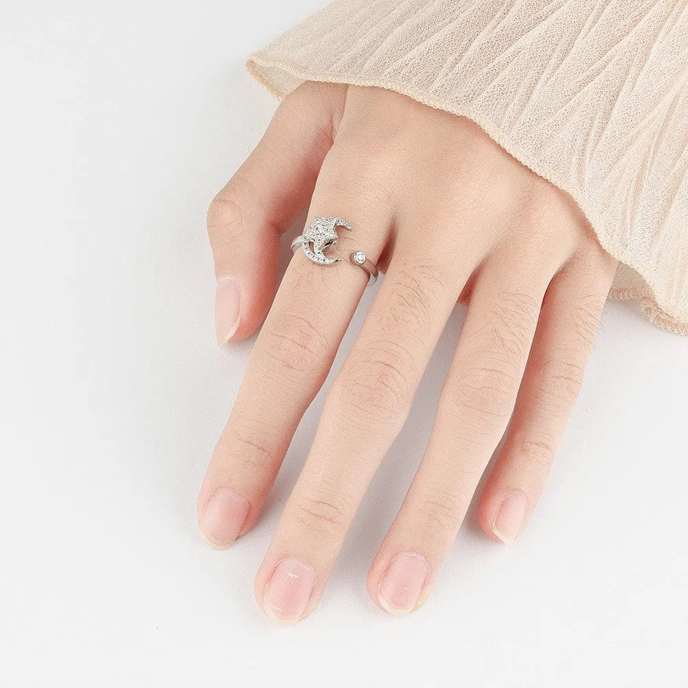 Gold copper micro-inlaid zircon star moon ring with adjustable opening on white background
