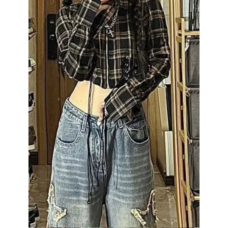 Blue straight-leg women's jeans with high waist design on hanger