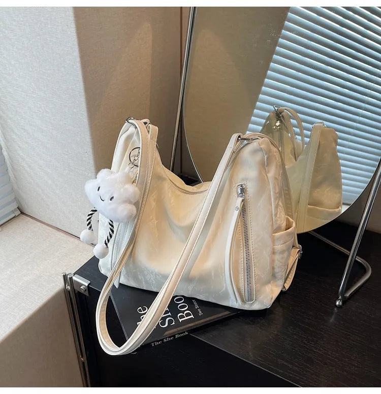Women's soft PU fashion backpack in black, milky white, silver or blue colours