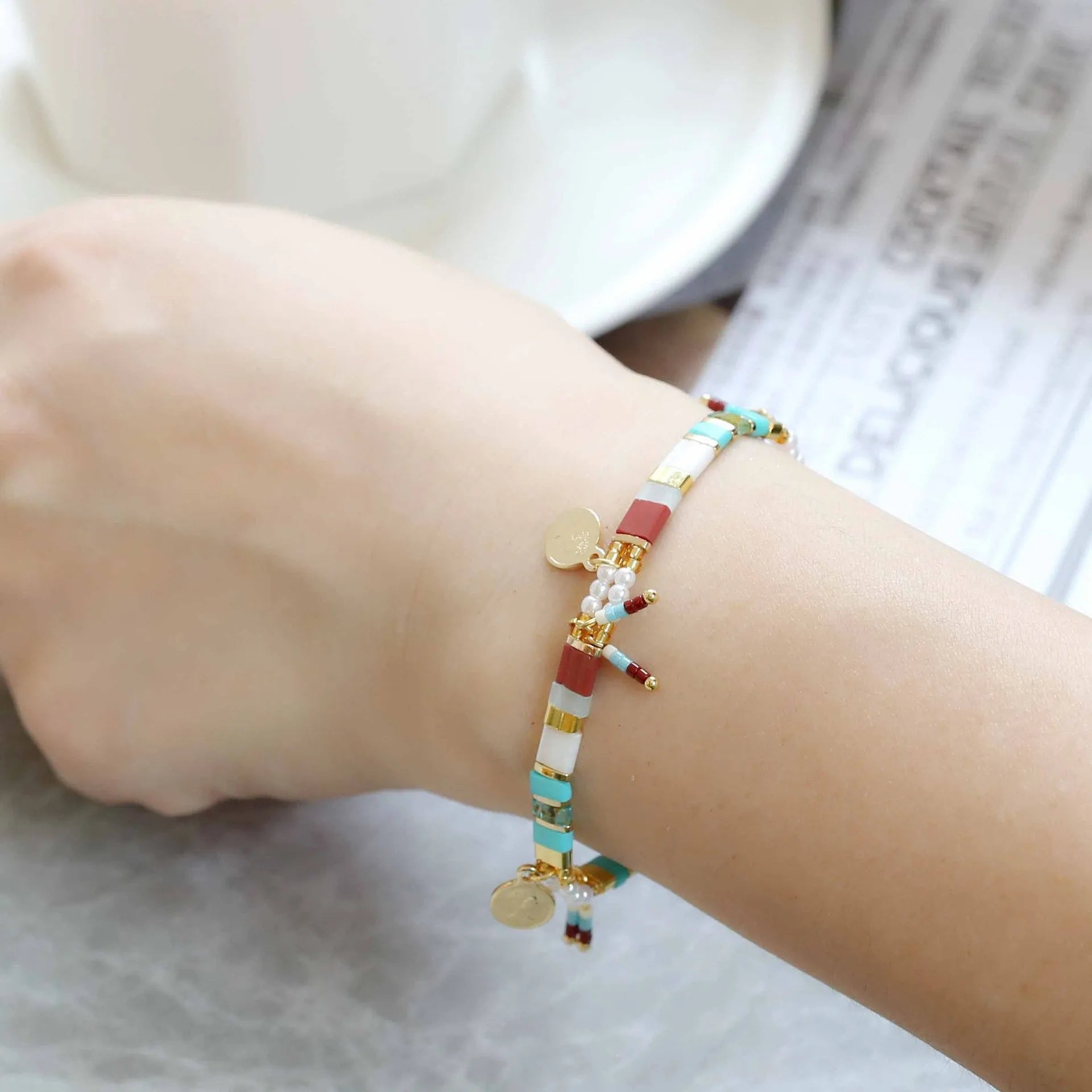 Women's handmade glass coloured beaded bracelet with imitation pearls in European American style.