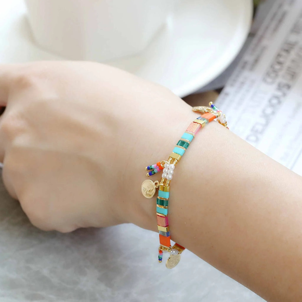 Women's handmade glass coloured beaded bracelet with imitation pearls in European American style.