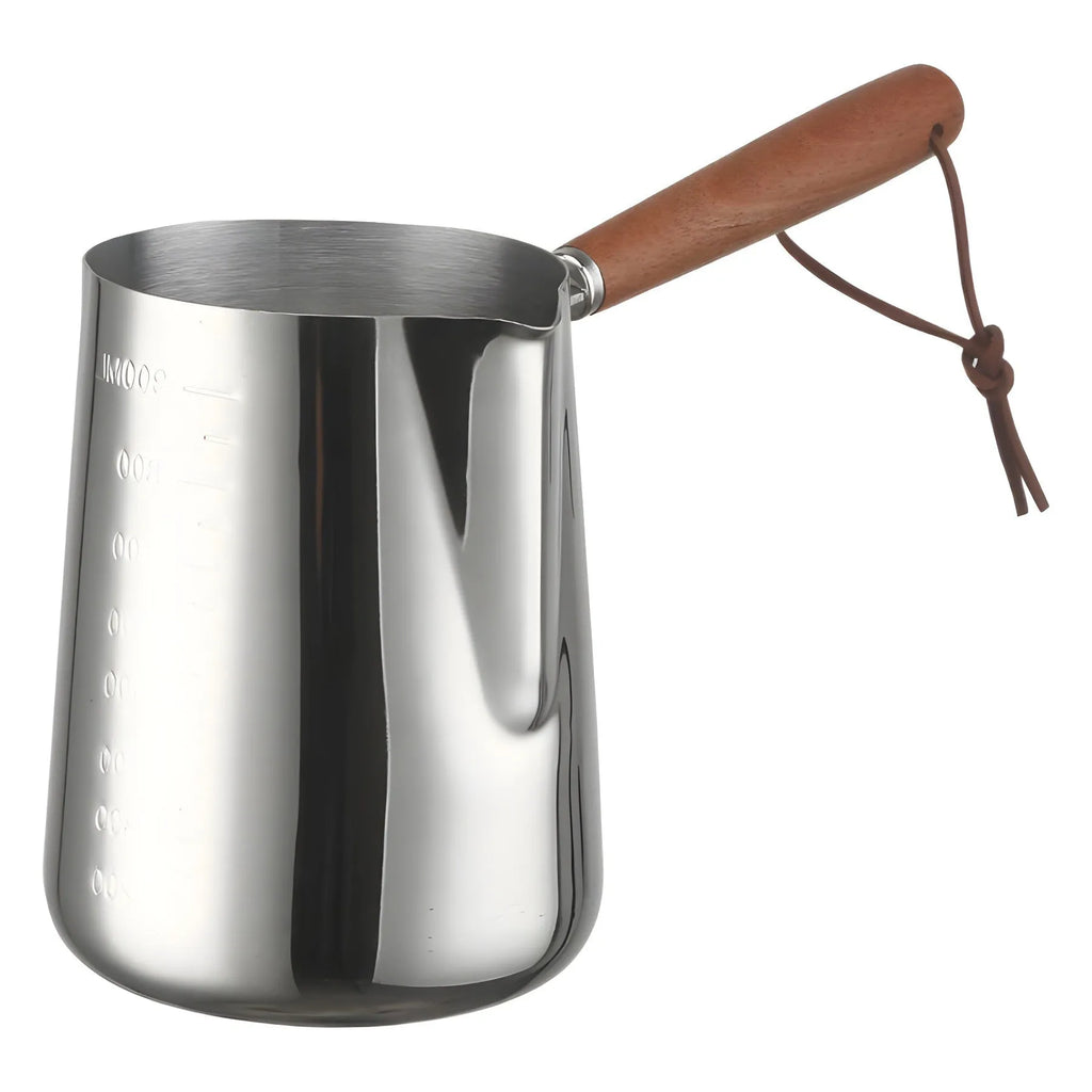 Stainless steel milk frothing jug with volume scale and wooden handle in three size options.
