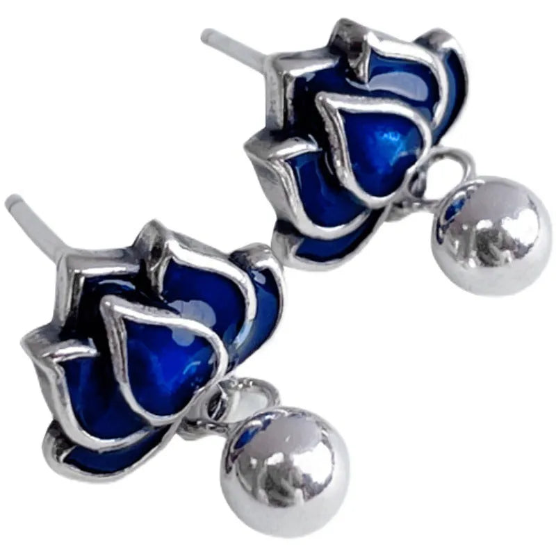 Blue lotus flower ear studs with seedpod tassels measuring 1.2cm wide