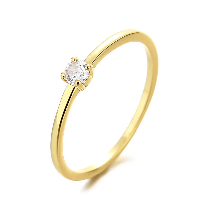 Women's copper ring with single diamond geometric design in round circle shape showing colour options