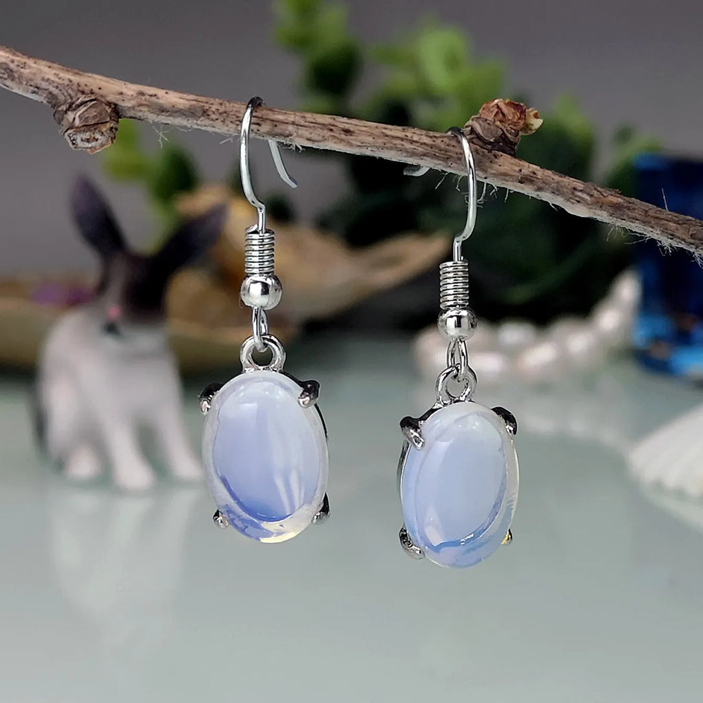 Opal cross pendant drop earrings with moonstone crystal accents measuring 20-24cm in retro vintage style
