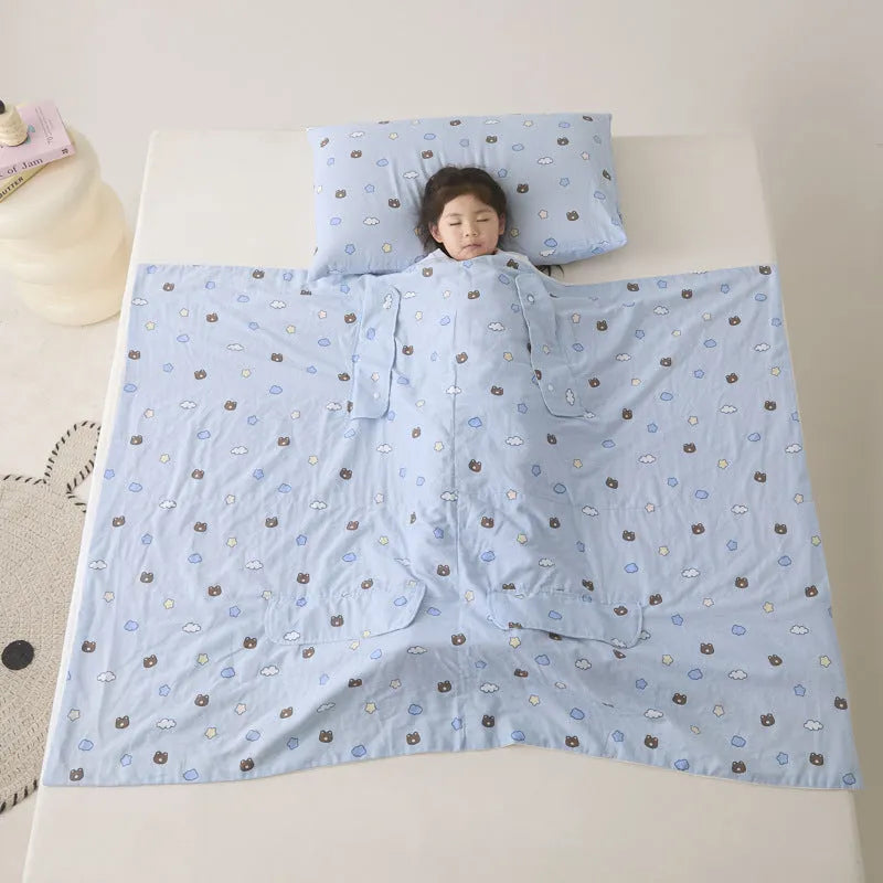 Anti-kick sleeping bag blanket in a summer design on a bed, showing its lightweight texture.