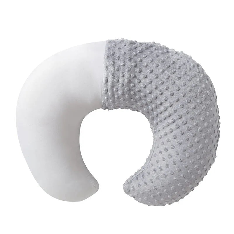 Nursing pillow with milk spill prevention feature in pink, yellow, grey, or light blue colours