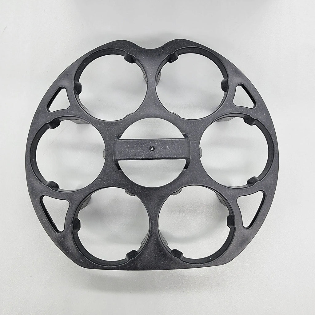 Black plastic egg holder rack with retainer for kitchen storage.