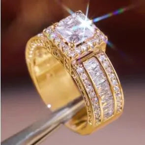 Geometric women's alloy ring in gold tone or white electroplated finish on a size guide showing UK sizes 5-13.