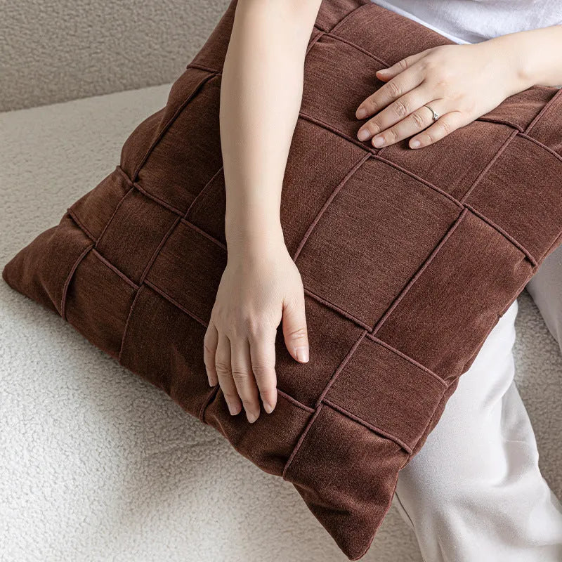 Chenille woven square cushion in beige colour on a sofa, showing its 50x50cm size and textured fabric.