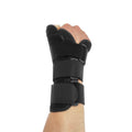 Carbon fibre sports wrist guard with thumb strap in black and grey.