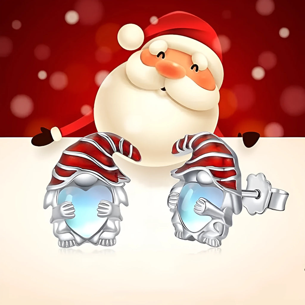 Close-up of women's heart-shaped earrings with a Santa Claus design in a white gold colour.