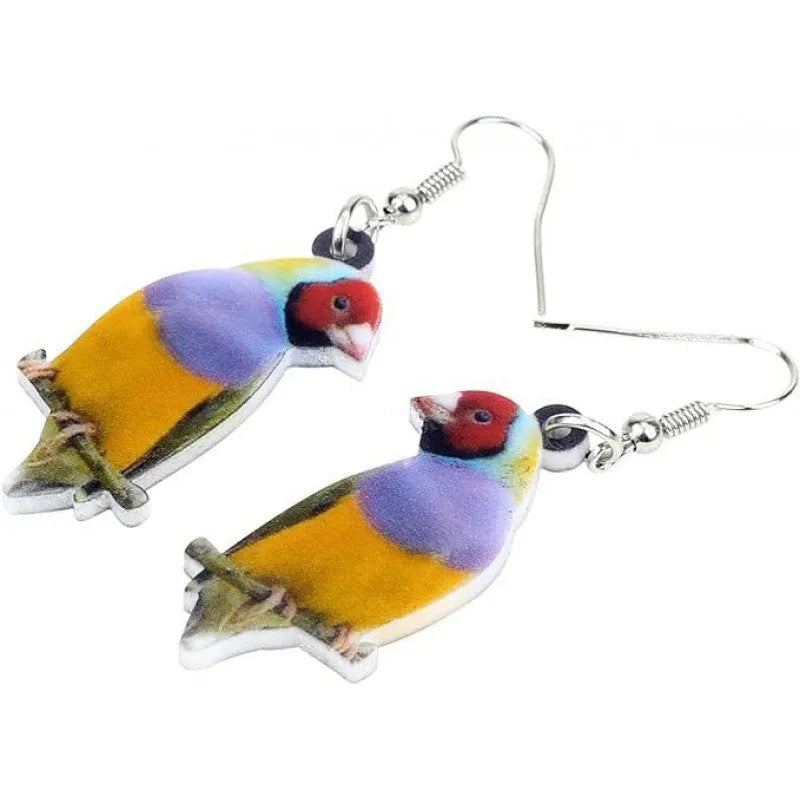 Blue Titmouse bird pendant acrylic earrings with geometric shapes and snake zodiac motifs.