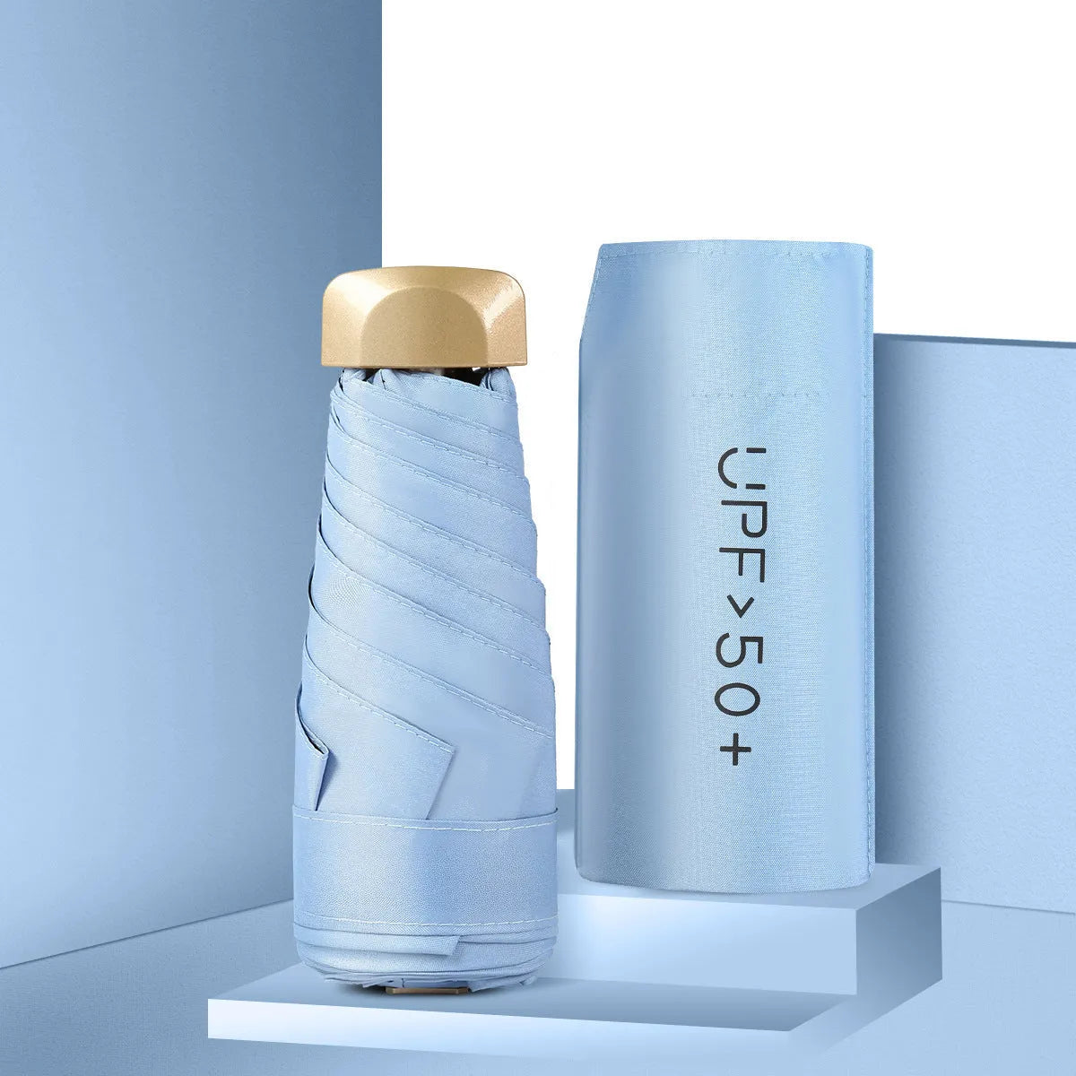 Closed 5-fold mini pocket sun umbrella showing compact size and rubber handle