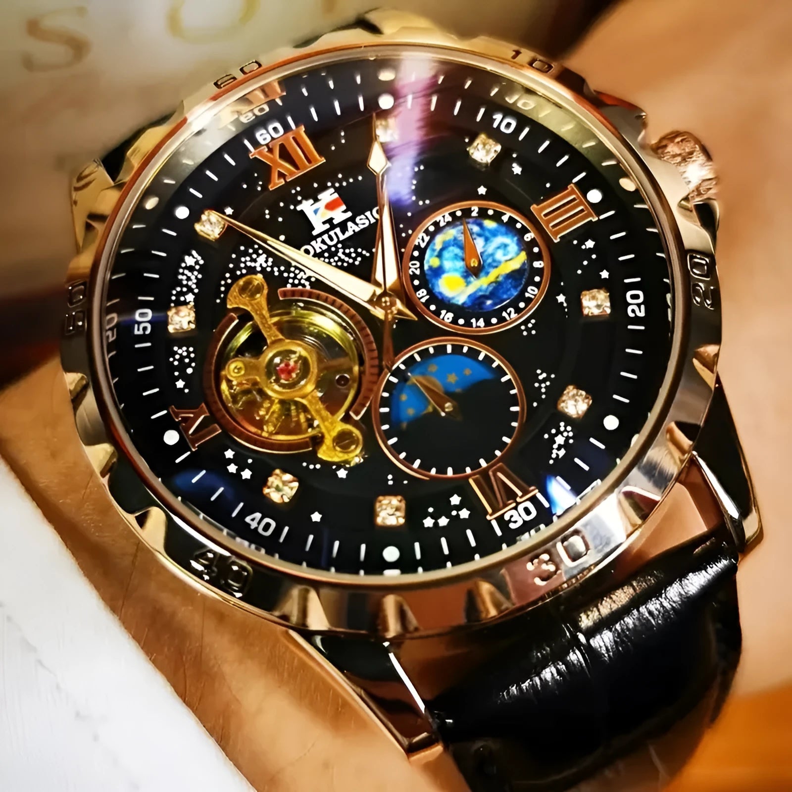 Men's black and rose gold automatic watch with hollow skeleton dial on a leather strap.