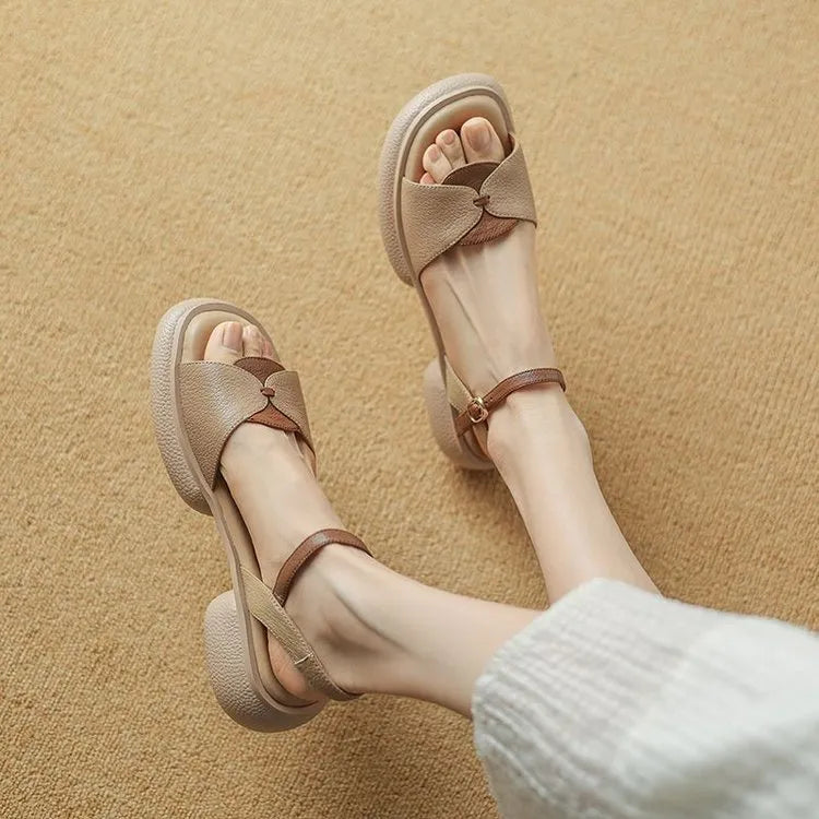 Women's beige platform sandals with chunky heel and open toe design on rubber sole