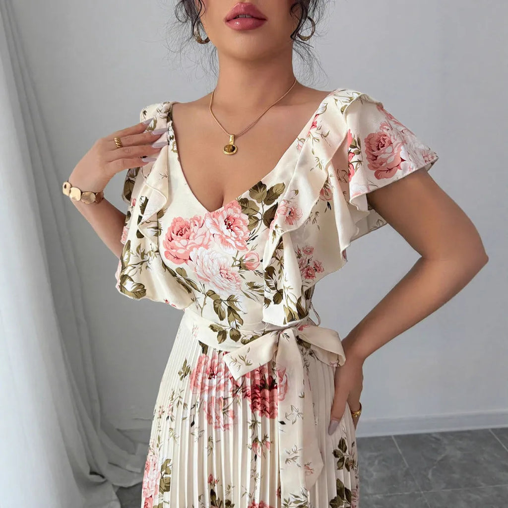 Apricot floral print dress with V-neck, ruffle sleeves, and swing skirt