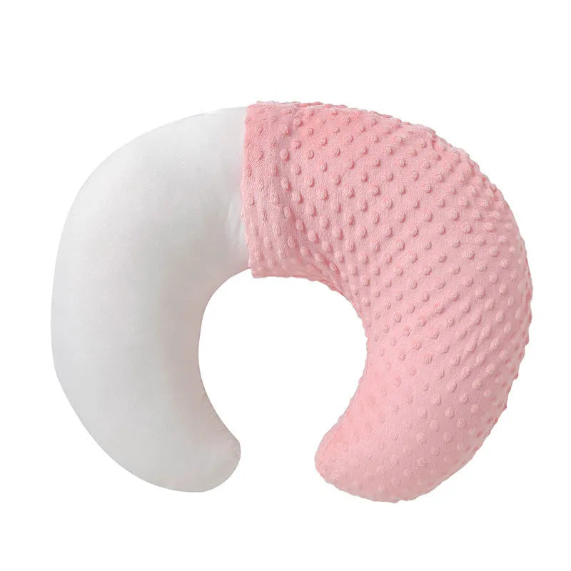 Nursing pillow with milk spill prevention feature in pink, yellow, grey, or light blue colours