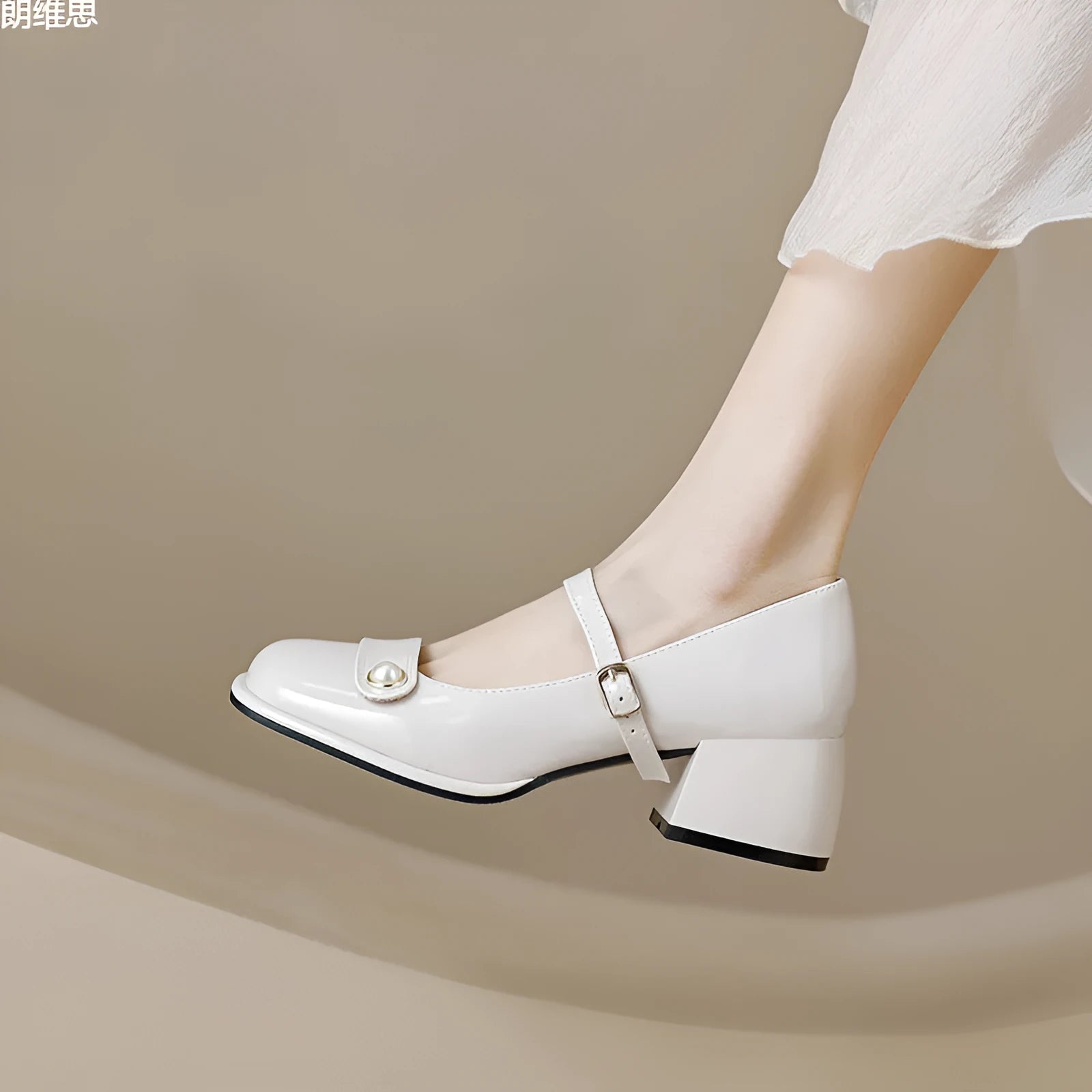 French style chunky heel hiking pump in patent leather with square toe and buckle closure