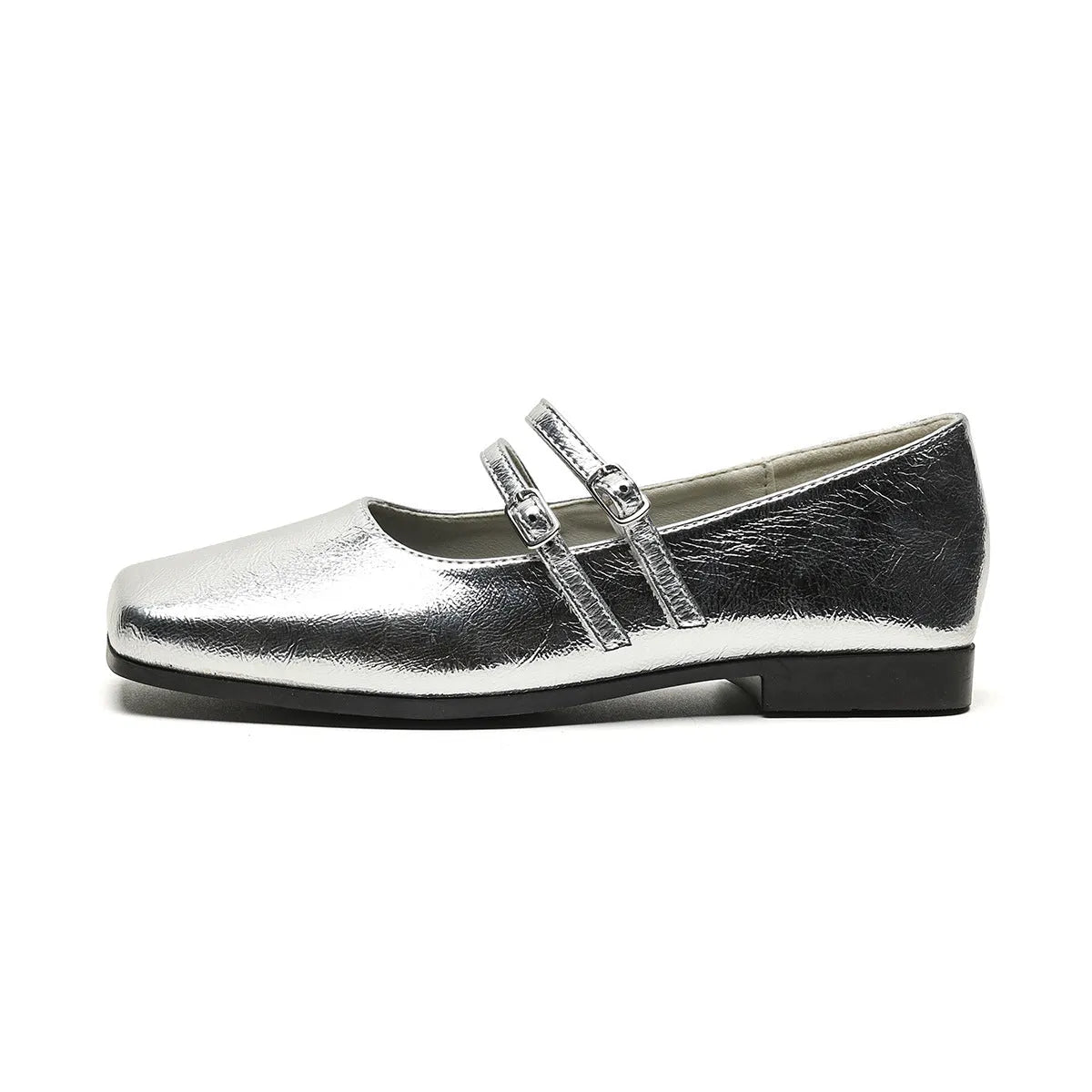 Women's silver genuine leather Mary Jane flats with a cross buckle strap and round toe.