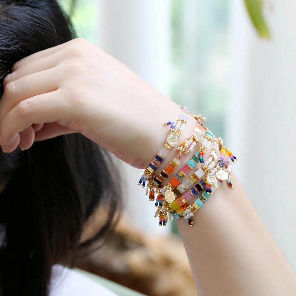 Women's handmade glass coloured beaded bracelet with imitation pearls in European American style.