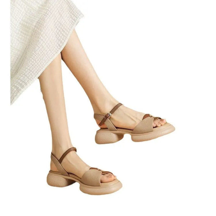 Women's beige platform sandals with chunky heel and open toe design on rubber sole
