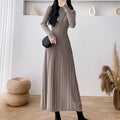 Women's high waist A-line midi skirt in a wool blend knit fabric, shown in milky white colour.