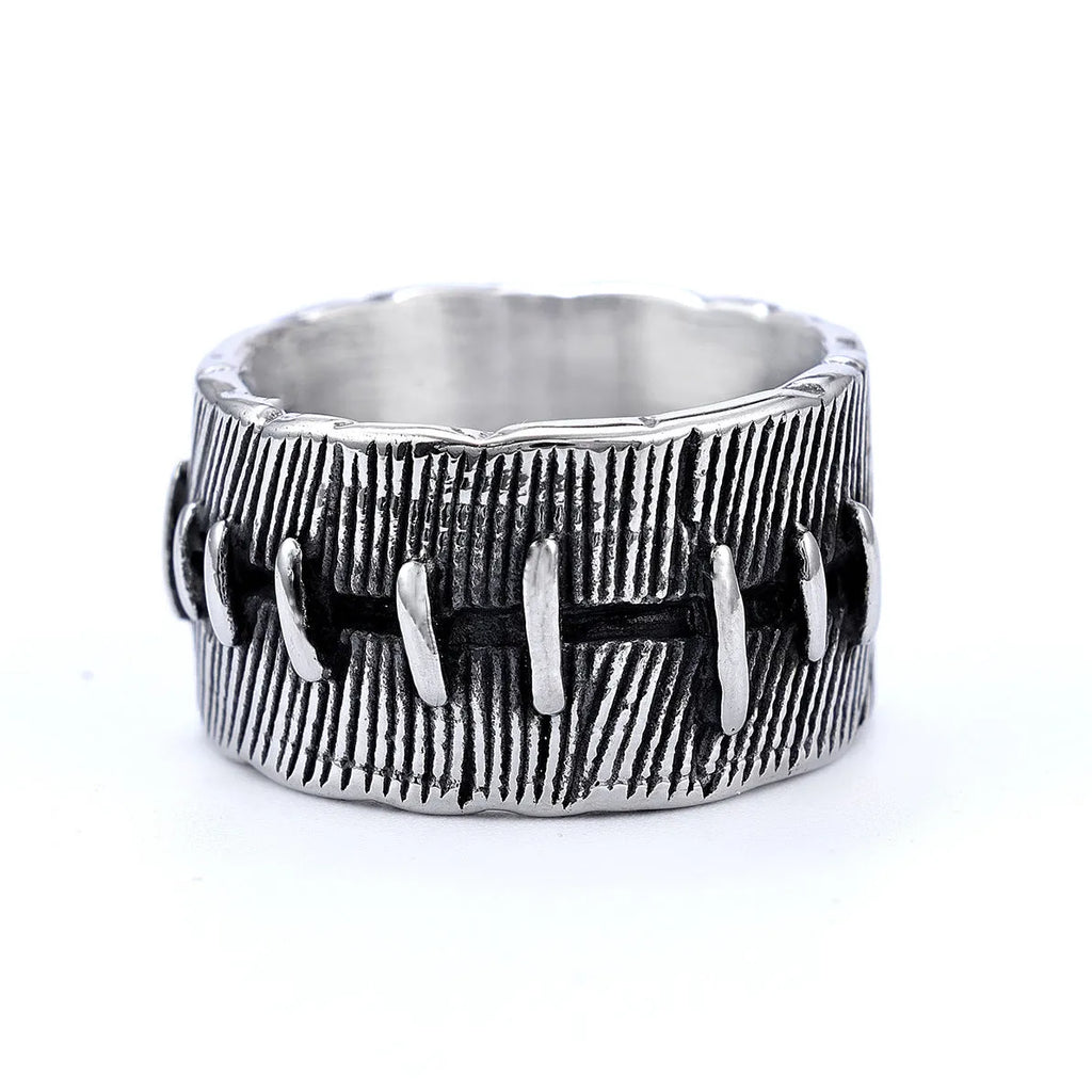 Dark punk geometric ring with double ring design and stitched detailing in retro colour on titanium steel