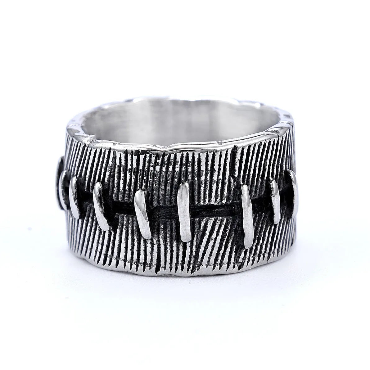 Dark punk geometric ring with double ring design and stitched detailing in retro colour on titanium steel
