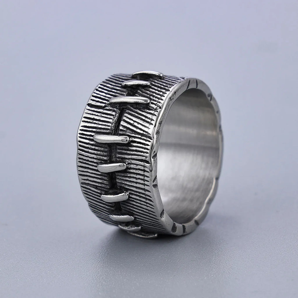 Dark punk geometric ring with double ring design and stitched detailing in retro colour on titanium steel