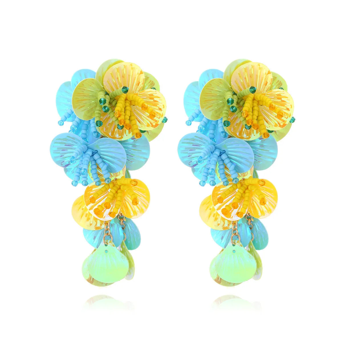 Close-up of colourful handmade bead flower earrings with leaves in European exaggerated style.