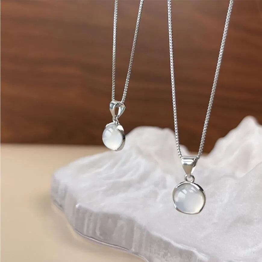 Women's oval geometric pendant necklace with artificial crystal on adjustable box chain