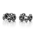 Stainless steel skull clip earrings with geometric hollow design and metallic finish