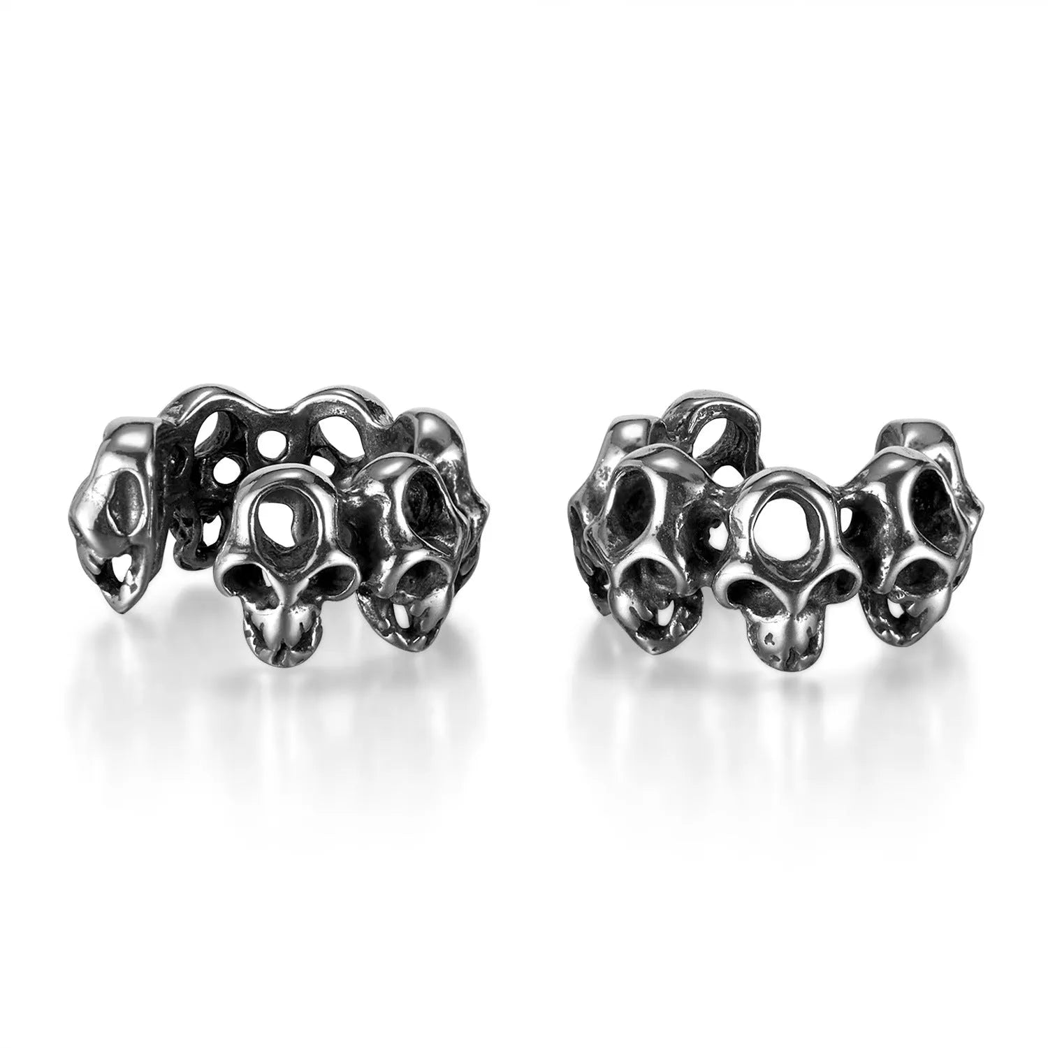 Stainless steel skull clip earrings with geometric hollow design and metallic finish