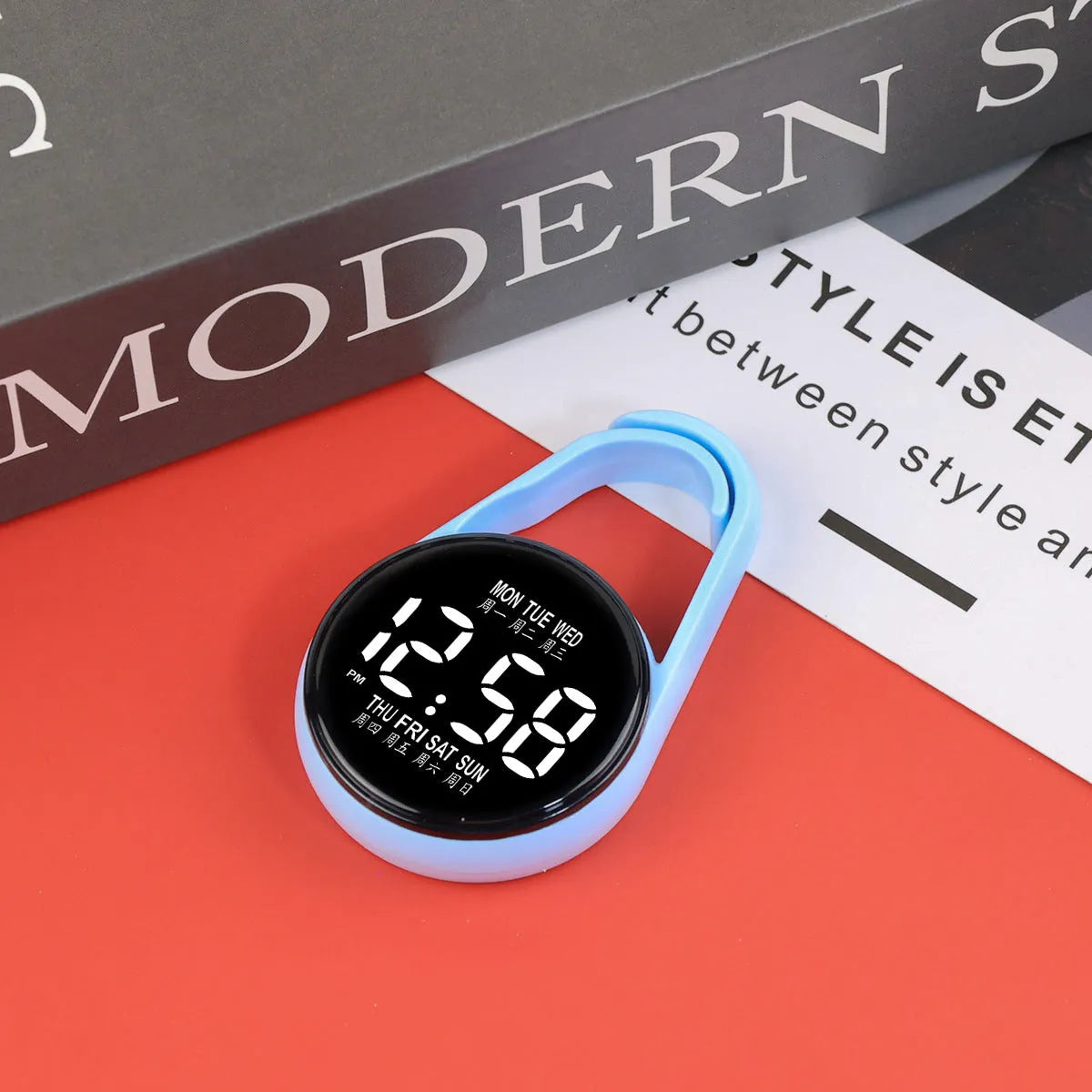 Digital LED wristwatch with luminous display and plastic strap in various colour options