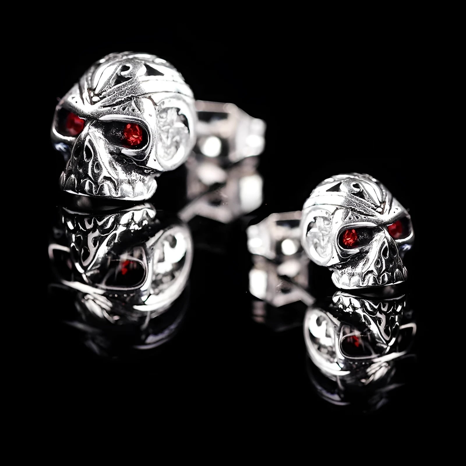 Red eye ghost head skull stud earrings in electroplated alloy with artificial gemstone inlay