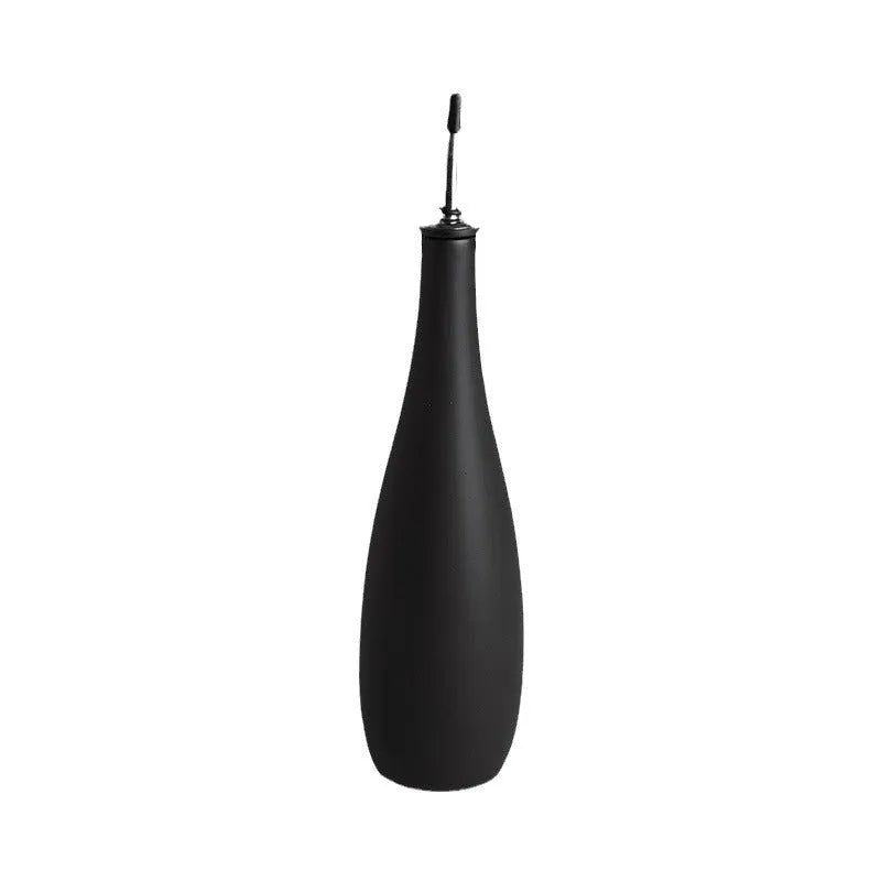 Ceramic oil pot with funnel and brush for kitchen oil storage in 650ml capacity