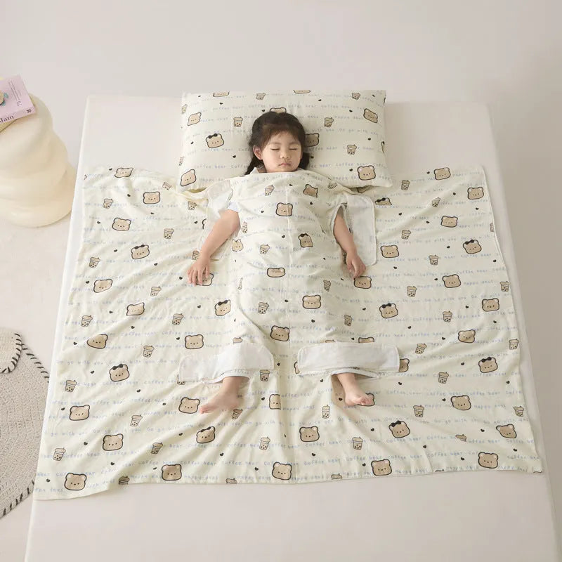 Anti-kick sleeping bag blanket in a summer design on a bed, showing its lightweight texture.