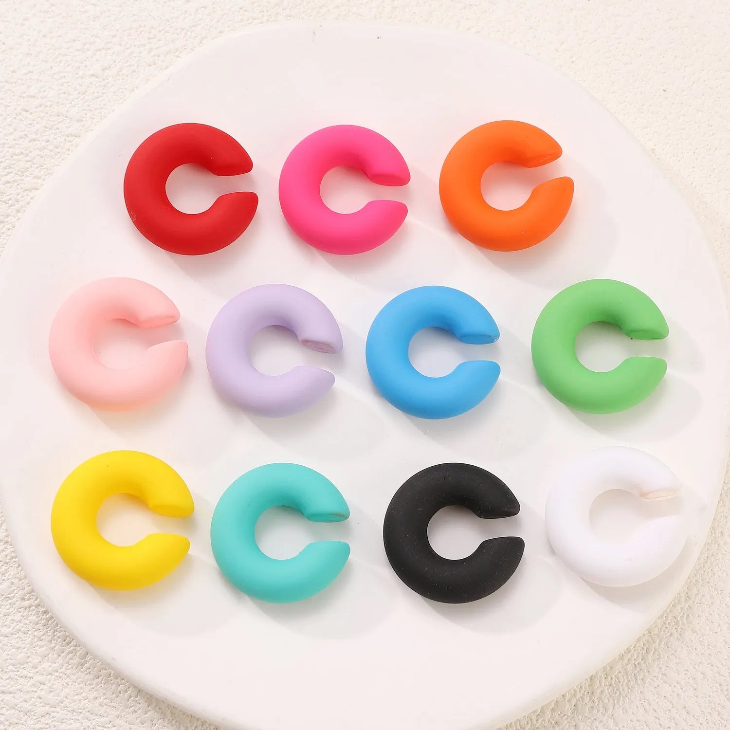 Round C-shaped matte finish clip-on earrings for women in various candy colours