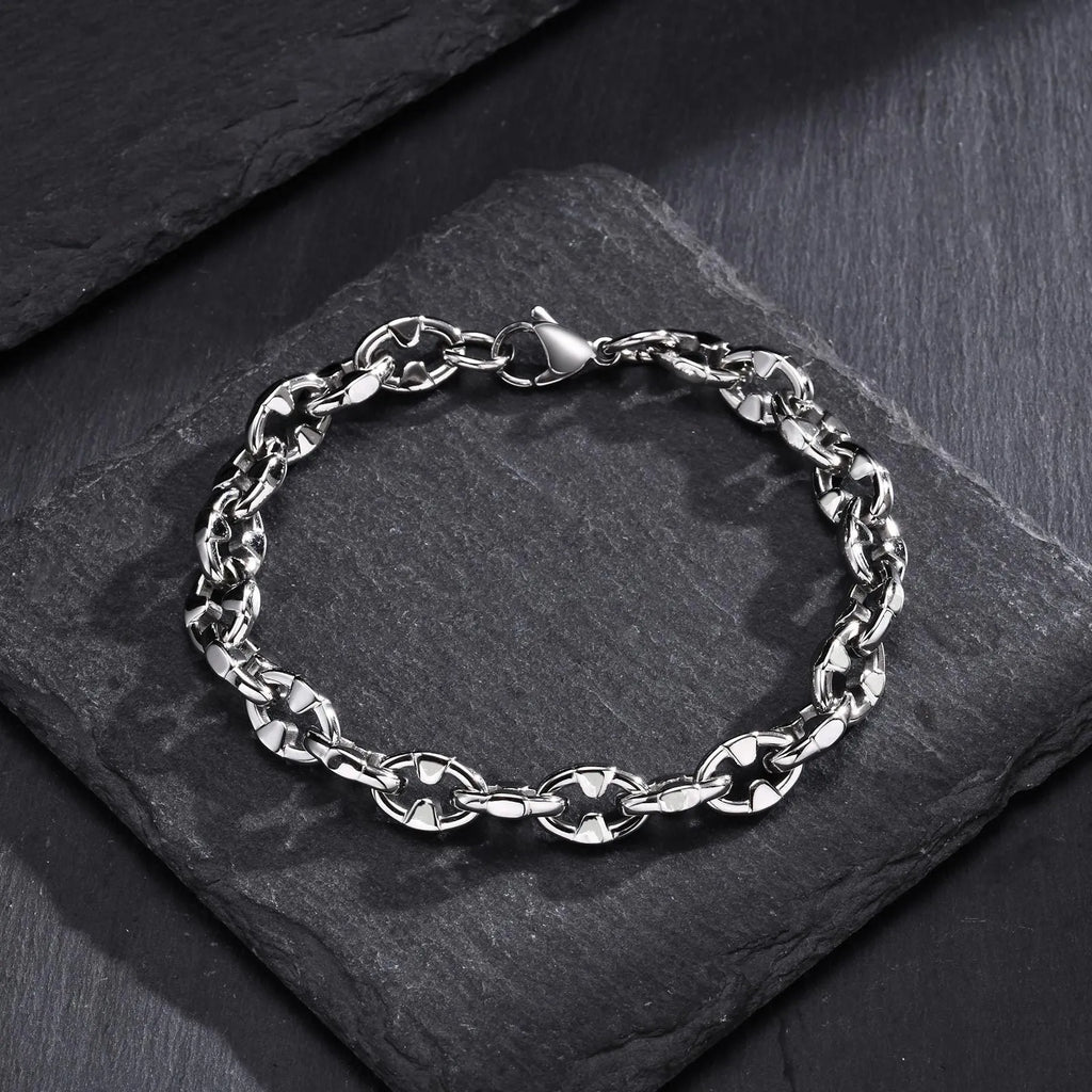 Thick handmade stainless steel chain bracelet with geometric links, steel colour.