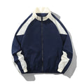 Men's black contrast stitch casual jacket with side seam pockets showing loose fit design
